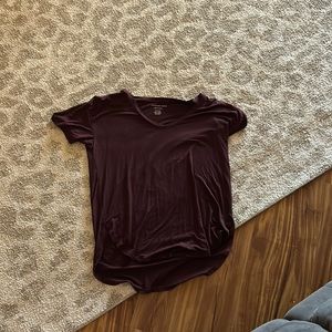 Maroon-ish brown cropped at the front long tee